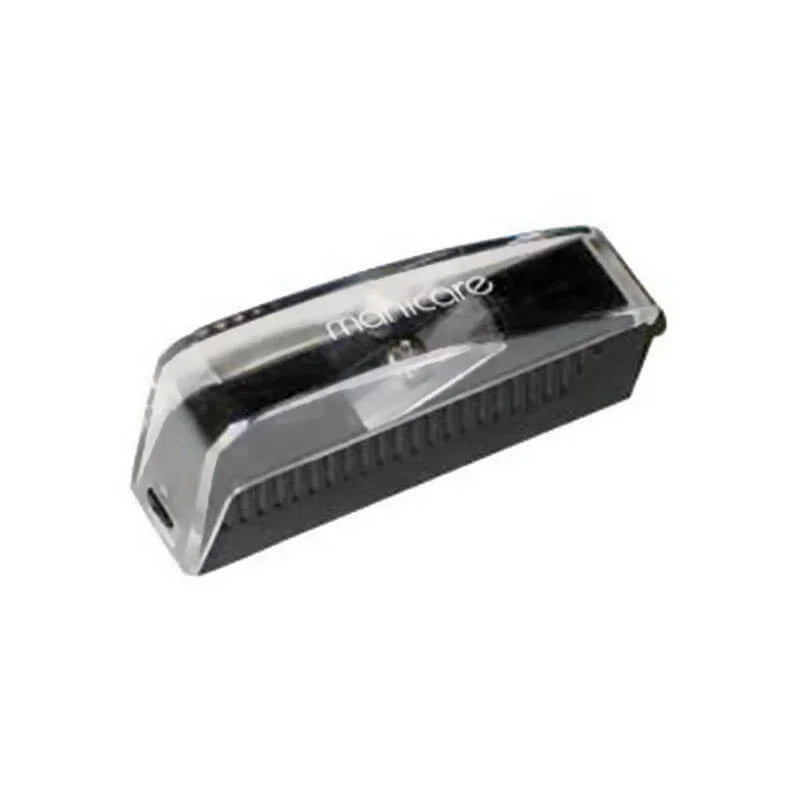 Single cosmetic pencil sharpener with clear lid on white background