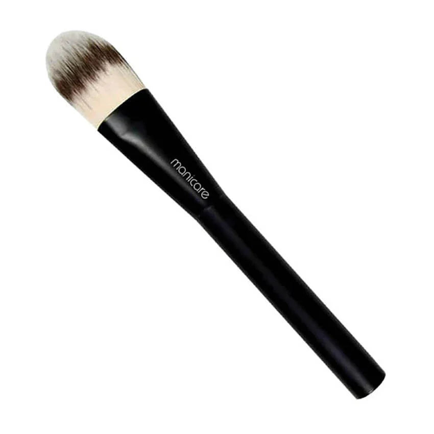 Makeup foundation brush with black handle and soft bristles on white background